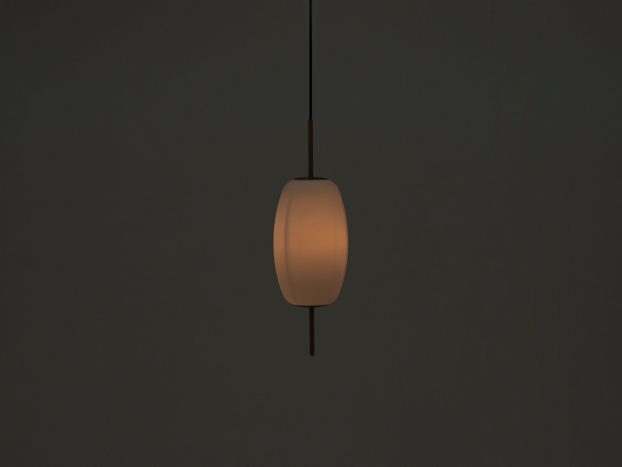 The medium brass Silk kitchen pendant lamp with light on